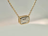 1.5ct emerald cut LAB diamond center set 18in 14kt yellow gold pendant
