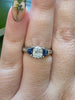 .91 Cushion Cut Center Diamond (H/VS2) With .5ctw Sapphire accents In 14kt White Gold