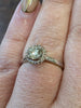 Warm Colored Natural .55ctw Center Diamond (VS/OP) With .05ctw Accents In 14kt White Gold Halo Mount Size 6.75