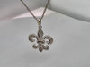 Fleur-de-lis Pendant 16mm x 15mm With .1ctw Diamond Accents & Necklace Both In 14kt White Gold