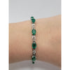 14kt White Gold Tennis Braccelet With 9ctw Natural EmeraldsMeasuring 7.25in Weighing 7.25g