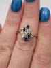 Natural .50ctw Sapphire Ring With .05ctw Diamond Accents In 14kt White Gold